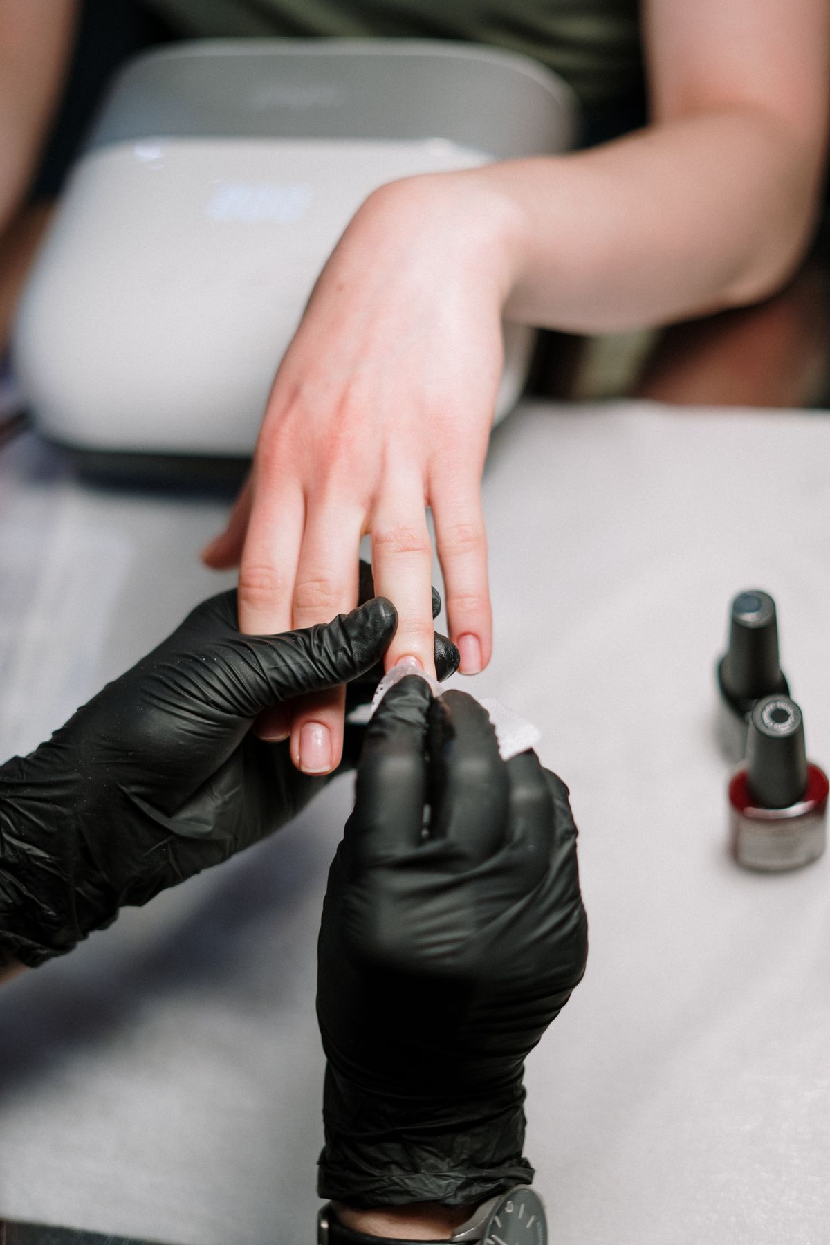 Manicure being applied at a nail salon
