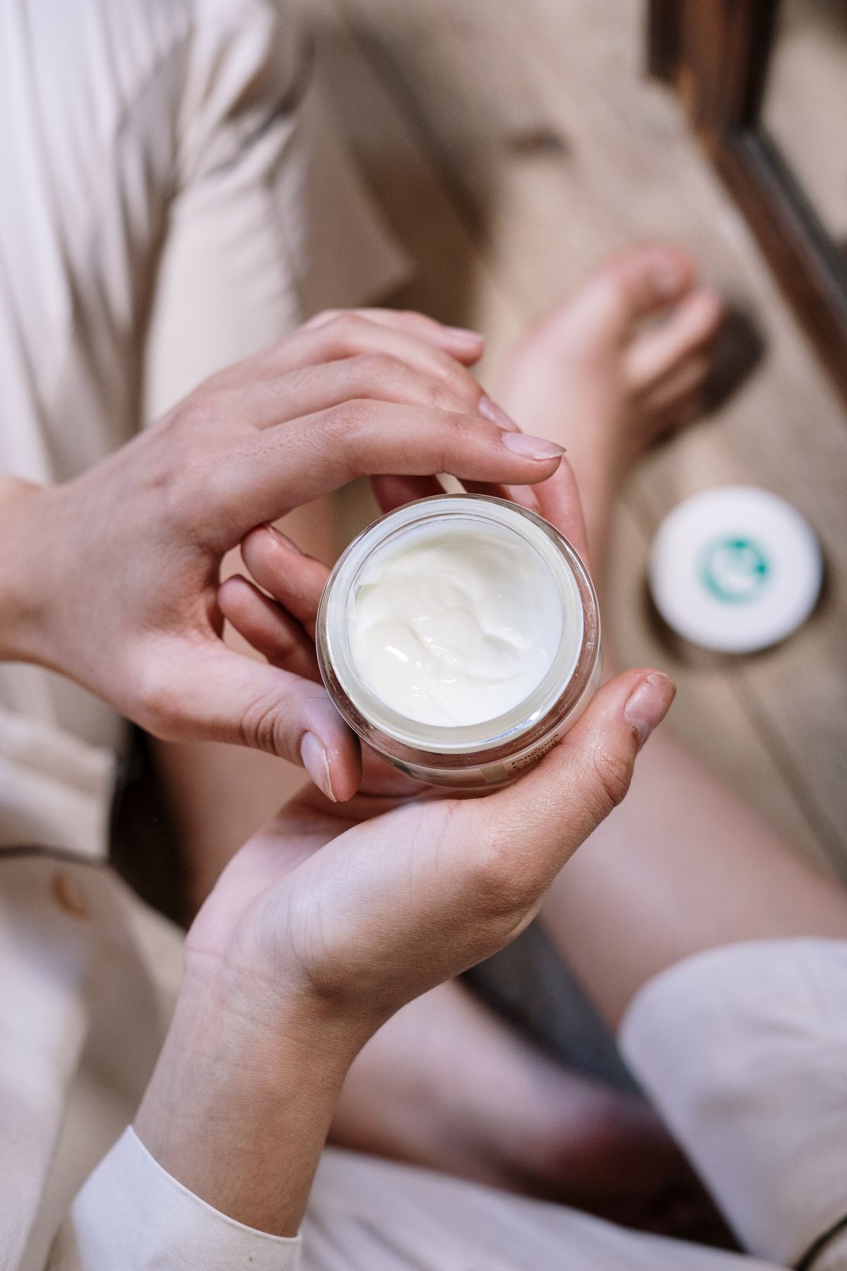 Applying foot cream during a pedicure